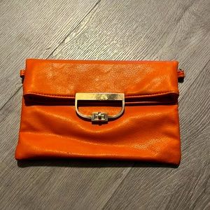 Medium size hand bag / purse. Orange. From Macys